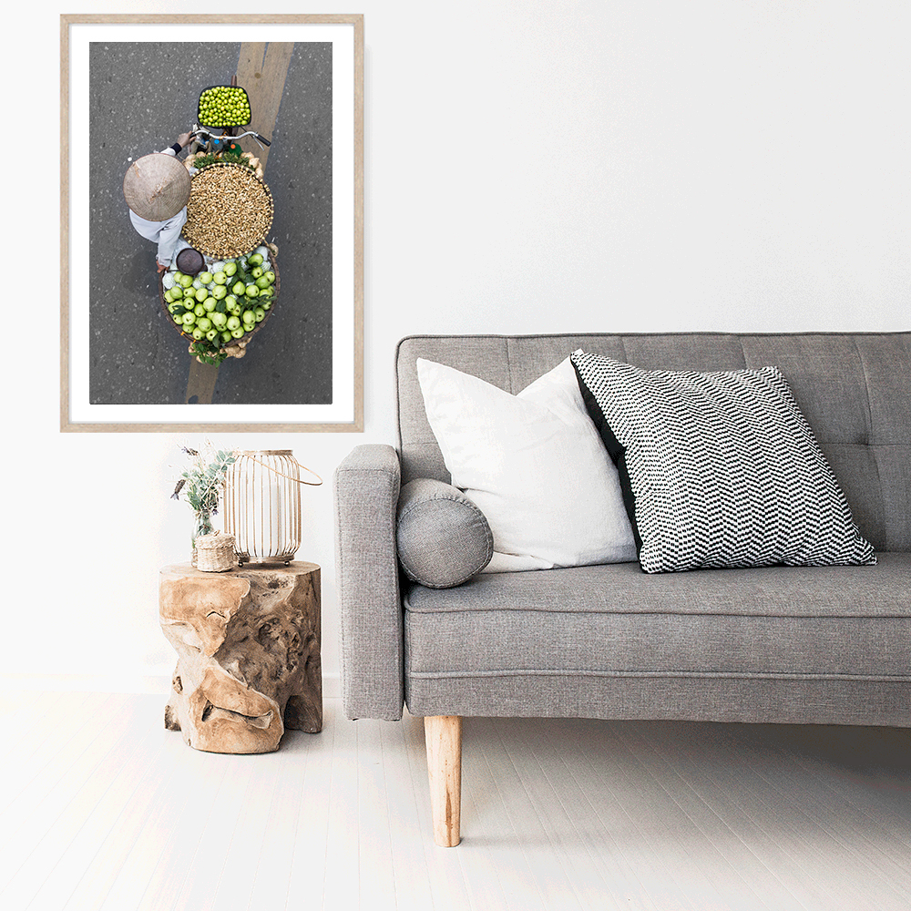 Merchant in Motion, mock up E, Fine art photography print of a Vietnamese flower vendor on a bicycle in Hanoi by Loes Heerink.